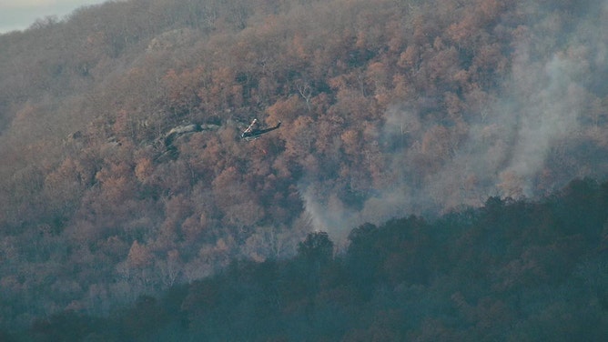 New York State Police and the New York Army National Guard helicopters dropped over 100 buckets of water on the Jennings Fire on Monday.