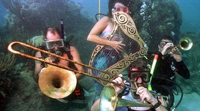 Underwater spectacle: Divers promote reef protection at Florida music festival