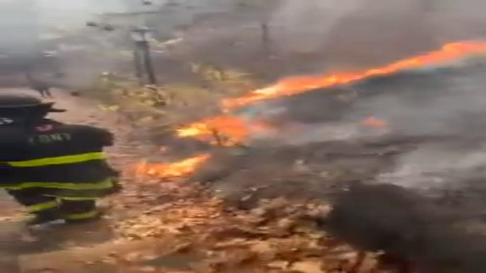 A brush fire reaches three alarms in New York City, the New York City Fire Department reports that no one was injured (@MarkLevineNYC/X).