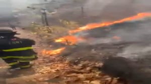 Brush fire burns Inwood Park in New York City